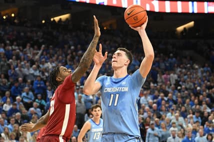 Dec 16, 2023; Omaha, Nebraska, USA; Creighton Bluejays center Ryan Kalkbrenner (11) attempts a shot against Alabama Crimson Tide forward Nick Pringle (23) in the second half at CHI Health Center Omaha. Mandatory Credit: Steven Branscombe-USA TODAY Sports