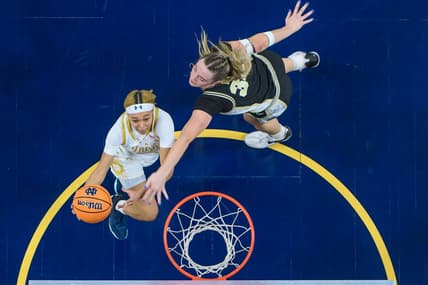 Dec 17, 2023; South Bend, Indiana, USA; Notre Dame Fighting Irish guard Hannah Hidalgo (3) goes up for a shot as Purdue Boilermakers forward Caitlyn Harper (34) defends in the first half at the Purcell Pavilion. Mandatory Credit: Matt Cashore-USA TODAY Sports