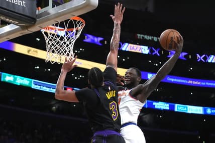 Dec 18, 2023; Los Angeles, California, USA; New York Knicks forward Julius Randle (30) shoots the ball against Los Angeles Lakers forward Anthony Davis (3) at Crypto.com Arena. Mandatory Credit: Kirby Lee-USA TODAY Sports