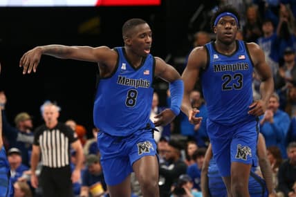 Dec 19, 2023; Memphis, Tennessee, USA; Memphis Tigers forward David Jones (8) reacts during the second half against the Virginia Cavaliers at FedExForum. Mandatory Credit: Petre Thomas-USA TODAY Sports