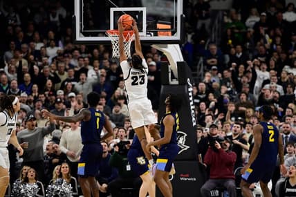 Dec 19, 2023; Providence, Rhode Island, USA; Providence Friars forward Bryce Hopkins (23) dunks the ball against the Marquette Golden Eagles at Amica Mutual Pavilion. Mandatory Credit: Eric Canha-USA TODAY Sports