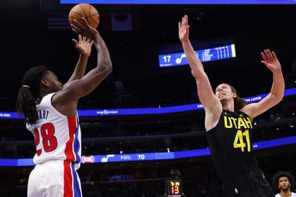 Dec 21, 2023; Detroit, Michigan, USA;  Detroit Pistons center Isaiah Stewart (28) shoots on Utah Jazz forward Kelly Olynyk (41) in the first half at Little Caesars Arena. Mandatory Credit: Rick Osentoski-USA TODAY Sports