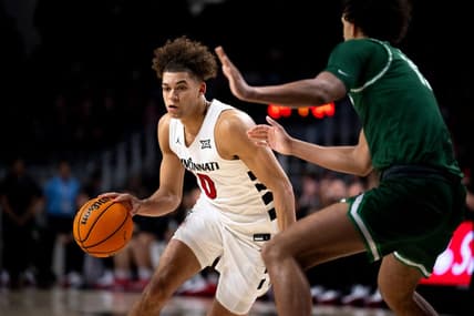 Cincinnati Bearcats guard Dan Skillings Jr. (0) drives to the basket in the first half of the basketball game between Cincinnati Bearcats and Stetson Hatters at Fifth Third Arena in Cincinnati on Friday, Dec. 22, 2023.