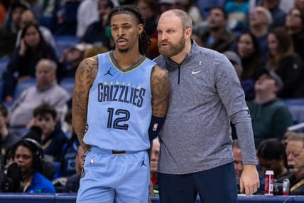 Dec 26, 2023; New Orleans, Louisiana, USA; Memphis Grizzlies head coach Taylor Jenkins talks with guard Ja Morant (12) in the second half against the New Orleans Pelicans at the Smoothie King Center. Mandatory Credit: Stephen Lew-USA TODAY Sports