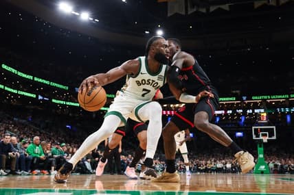 Dec 29, 2023; Boston, Massachusetts, USA; Boston Celtics forward Jaylen Brown (7) drives to the basket during the first half against the Toronto Raptors at TD Garden. Mandatory Credit: Paul Rutherford-USA TODAY Sports