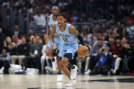 Dec 29, 2023; Los Angeles, California, USA;  Memphis Grizzlies guard Ja Morant (12) dribbles the ball during the first quarter against the Los Angeles Clippers at Crypto.com Arena. Mandatory Credit: Kiyoshi Mio-USA TODAY Sports
