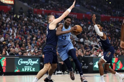 Dec 29, 2023; Los Angeles, California, USA;  Memphis Grizzlies forward Jaren Jackson Jr. (13) drives to the basket against Los Angeles Clippers center Ivica Zubac (40) during the first quarter at Crypto.com Arena. Mandatory Credit: Kiyoshi Mio-USA TODAY Sports
