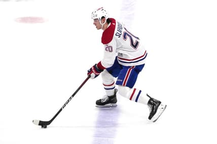 Dec 30, 2023; Sunrise, Florida, USA;  Montreal Canadiens left wing Juraj Slafkovsky (20) brings the puck up the ice against the Florida Panthers during the second period at Amerant Bank Arena. Mandatory Credit: Jim Rassol-USA TODAY Sports