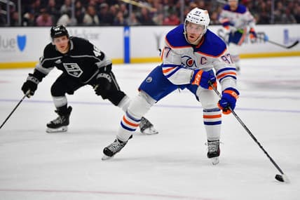 Dec 30, 2023; Los Angeles, California, USA; Edmonton Oilers center Connor McDavid (97) moves in for a shot on goal against the Los Angeles Kings during the third period at Crypto.com Arena. Mandatory Credit: Gary A. Vasquez-USA TODAY Sports