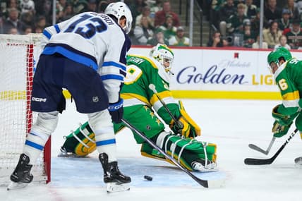 Dec 31, 2023; Saint Paul, Minnesota, USA; Minnesota Wild goaltender Marc-Andre Fleury (29) defends his net as Winnipeg Jets center Gabriel Vilardi (13) looks to shoot during the first period at Xcel Energy Center. Mandatory Credit: Matt Krohn-USA TODAY Sports
