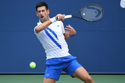 Sep 6, 2020; Flushing Meadows, New York, USA; Novak Djokovic of Serbia hits a forehand against Pablo Carreno Busta of Spain (not pictured) on day seven of the 2020 U.S. Open tennis tournament at USTA Billie Jean King National Tennis Center. Mandatory Credit: Danielle Parhizkaran-USA TODAY Sports