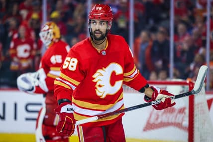 Calgary Flames defenseman Oliver Kylington (58) skates against the Edmonton Oilers during the second period in game two of the second round of the 2022 Stanley Cup Playoffs at Scotiabank Saddledome. Mandatory Credit: Sergei Belski-USA TODAY Sports