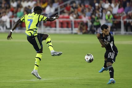 Jul 19, 2023; Washington, DC, USA; MLS All-Stars midfielder Luciano Acosta (11) blocks the shot of Arsenal midfielder Bukayo Saka (7) in the 2023 MLS All Star Game at Audi Field. Mandatory Credit: Geoff Burke-USA TODAY Sports