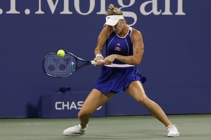 Sep 2, 2023; Flushing, NY, USA; Marketa Vondrusova of Czech Republic hits a backhand against Ekaterina Alexandrova (not pictured) on day six of the 2023 U.S. Open tennis tournament at USTA Billie Jean King National Tennis Center. Mandatory Credit: Geoff Burke-USA TODAY Sports