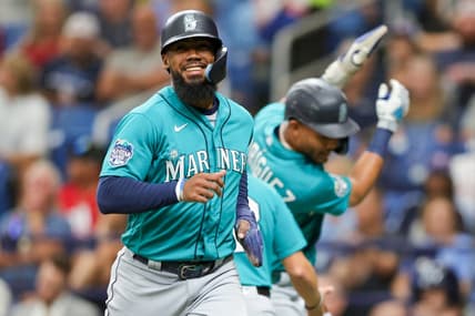 Sep 9, 2023; St. Petersburg, Florida, USA;  Seattle Mariners right fielder Teoscar Hernandez (35) celebrates after scoring a run against the Tampa Bay Rays in the first inning at Tropicana Field. Mandatory Credit: Nathan Ray Seebeck-USA TODAY Sports