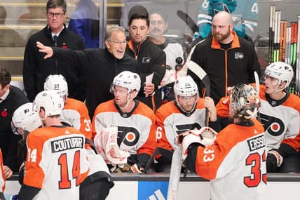 Nov 7, 2023; San Jose, California, USA; Philadelphia Flyers head coach John Tortorella instructs goaltender Samuel Ersson (33) during the third period against the San Jose Sharks at SAP Center at San Jose. Mandatory Credit: Robert Edwards-USA TODAY Sports