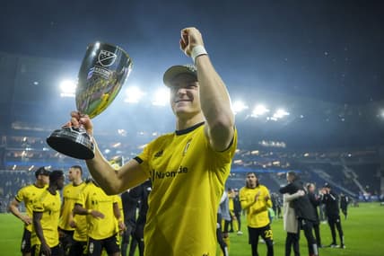 Dec 2, 2023; Cincinnati, Ohio, USA;  Columbus Crew defender Julian Gressel (7) celebrates with the trophy after defeating FC Cincinnati at TQL Stadium. Mandatory Credit: Aaron Doster-USA TODAY Sports
