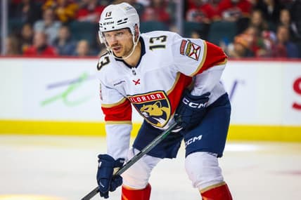 Dec 18, 2023; Calgary, Alberta, CAN; Florida Panthers center Sam Reinhart (13) during the face off against the Calgary Flames during the third period at Scotiabank Saddledome. Mandatory Credit: Sergei Belski-USA TODAY Sports
