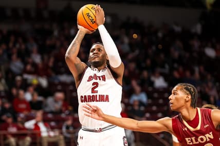 Dec 22, 2023; Columbia, South Carolina, USA; South Carolina Gamecocks forward B.J. Mack (2) shoots over Elon Phoenix guard LA Pratt (22) in the first half at Colonial Life Arena. Mandatory Credit: Jeff Blake-USA TODAY Sports