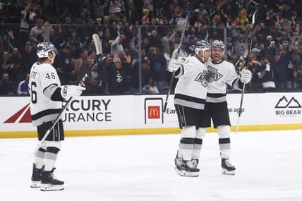 Dec 27, 2023; Los Angeles, California, USA; Los Angeles Kings center Trevor Lewis (61) celebrates with his teammates after scoring a goal during the second period of a game against the San Jose Sharks at Crypto.com Arena. Mandatory Credit: Jessica Alcheh-USA TODAY Sports