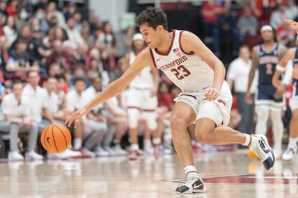 Dec 31, 2023; Stanford, California, USA; Stanford Cardinal forward Brandon Angel (23) reaches for the ball during the second half against the Arizona Wildcats at Maples Pavilion. Mandatory Credit: Stan Szeto-USA TODAY Sports