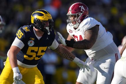 Jan 1, 2024; Pasadena, CA, USA; Alabama Crimson Tide offensive lineman Kadyn Proctor (74) blocks Michigan Wolverines defensive lineman Mason Graham (55) during the first half in the 2024 Rose Bowl college football playoff semifinal game at Rose Bowl. Mandatory Credit: Kirby Lee-USA TODAY Sports