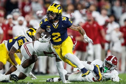 Michigan running back Blake Corum (2) runs against Alabama during the second half of the Rose Bowl in Pasadena, Calif., on Monday, Jan. 1, 2024.