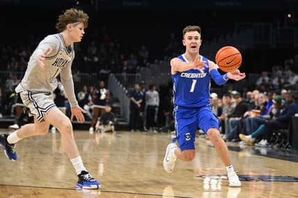 Jan 2, 2024; Washington, District of Columbia, USA; Creighton Bluejays guard Steven Ashworth (1) passes the ball as Georgetown Hoyas guard Rowan Brumbaugh (1) looks on during the first half at Capital One Arena. Mandatory Credit: Brad Mills-USA TODAY Sports
