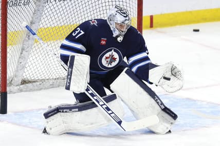 Jan 2, 2024; Winnipeg, Manitoba, CAN;  Winnipeg Jets goaltender Connor Hellebuyck (37) warms up before a game against the Tampa Bay Lightning at Canada Life Centre. Mandatory Credit: James Carey Lauder-USA TODAY Sports
