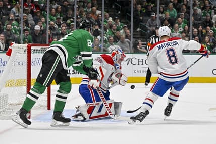Jan 2, 2024; Dallas, Texas, USA; Dallas Stars center Roope Hintz (24) attempts to put the puck past Montreal Canadiens goaltender Sam Montembeault (35) and defenseman Mike Matheson (8) during the second period at the American Airlines Center. Mandatory Credit: Jerome Miron-USA TODAY Sports