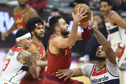 Jan 3, 2024; Cleveland, Ohio, USA; Cleveland Cavaliers guard Max Strus (1) drives against Washington Wizards center Daniel Gafford (21) in the first quarter at Rocket Mortgage FieldHouse. Mandatory Credit: David Richard-USA TODAY Sports