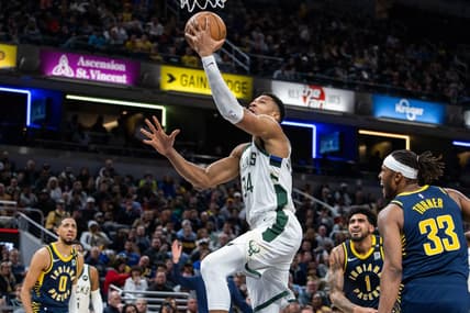 Jan 3, 2024; Indianapolis, Indiana, USA; Milwaukee Bucks forward Giannis Antetokounmpo (34) shoots the ball while Indiana Pacers center Myles Turner (33) defends in the second quarter at Gainbridge Fieldhouse. Mandatory Credit: Trevor Ruszkowski-USA TODAY Sports