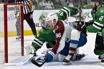 Jan 4, 2024; Dallas, Texas, USA; Dallas Stars goaltender Scott Wedgewood (41) stops a shot by Colorado Avalanche right wing Mikko Rantanen (96) during the first period at the American Airlines Center. Mandatory Credit: Jerome Miron-USA TODAY Sports