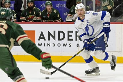 Jan 4, 2024; Saint Paul, Minnesota, USA; Tampa Bay Lightning forward Steven Stamkos (91) controls the puck against the Minnesota Wild during the first period at Xcel Energy Center. Mandatory Credit: Nick Wosika-USA TODAY Sports