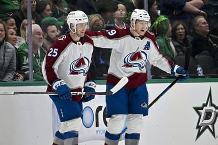 Jan 4, 2024; Dallas, Texas, USA; Colorado Avalanche right wing Logan O'Connor (25) and center Nathan MacKinnon (29) celebrates the game winning goal scored by MacKinnon during the overtime period against the Dallas Stars at the American Airlines Center. Mandatory Credit: Jerome Miron-USA TODAY Sports