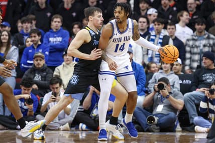 Jan 6, 2024; Newark, New Jersey, USA; Seton Hall Pirates guard Dre Davis (14) dribbles against Marquette Golden Eagles guard Tyler Kolek (11) during the first half at Prudential Center. Mandatory Credit: Vincent Carchietta-USA TODAY Sports