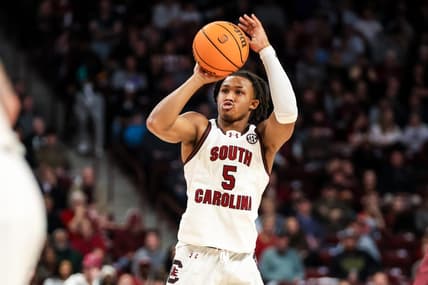 Jan 6, 2024; Columbia, South Carolina, USA; South Carolina Gamecocks guard Meechie Johnson (5) attempts a three point basket ams in the first half at Colonial Life Arena. Mandatory Credit: Jeff Blake-USA TODAY Sports