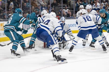 Jan 6, 2024; San Jose, California, USA; Toronto Maple Leafs goaltender Martin Jones (31) makes a save against San Jose Sharks center Mike Hoffman (68) during the second period at SAP Center at San Jose. Mandatory Credit: Neville E. Guard-USA TODAY Sports