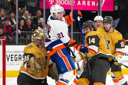 Jan 6, 2024; Las Vegas, Nevada, USA; A shot deflects off New York Islanders center Kyle Palmieri (21) between Vegas Golden Knights goaltender Logan Thompson (36) and Vegas Golden Knights defenseman Nicolas Hague (14) during the first period at T-Mobile Arena. Mandatory Credit: Stephen R. Sylvanie-USA TODAY Sports