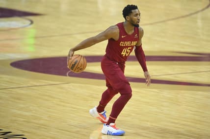 Jan 7, 2024; Cleveland, Ohio, USA; Cleveland Cavaliers guard Donovan Mitchell (45) dribbles the ball in the first quarter against the San Antonio Spurs at Rocket Mortgage FieldHouse. Mandatory Credit: David Richard-USA TODAY Sports