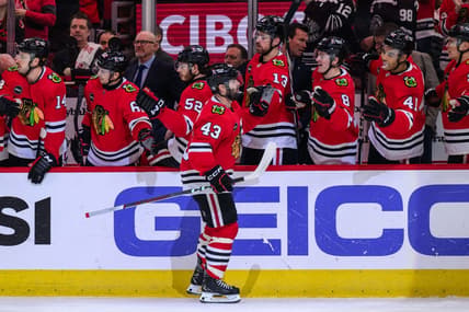 Jan 7, 2024; Chicago, Illinois, USA; Chicago Blackhawks center Colin Blackwell (43) celebrates his goal with teammates against the Calgary Flames during the first period at the United Center. Mandatory Credit: Daniel Bartel-USA TODAY Sports