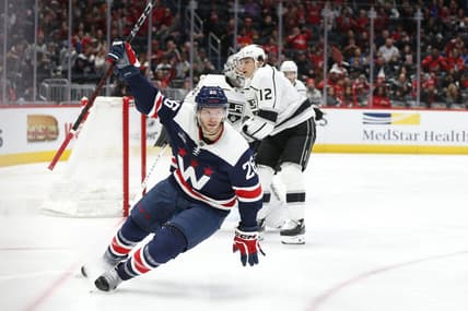 Jan 7, 2024; Washington, District of Columbia, USA; Washington Capitals right wing Nic Dowd (26) celebrates after scoring a goal past Los Angeles Kings goaltender Cam Talbot (39) during the second period at Capital One Arena. Mandatory Credit: Amber Searls-USA TODAY Sports