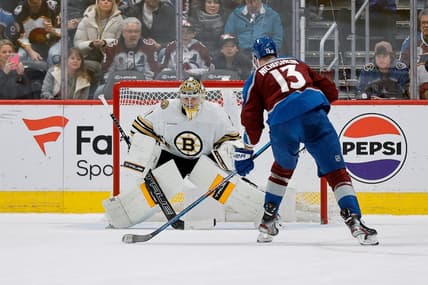 Jan 8, 2024; Denver, Colorado, USA; Colorado Avalanche right wing Valeri Nichushkin (13) scores the game winning shootout goal against Boston Bruins goaltender Jeremy Swayman (1) at Ball Arena. Mandatory Credit: Isaiah J. Downing-USA TODAY Sports