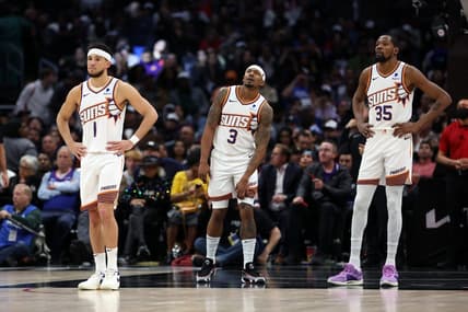Jan 8, 2024; Los Angeles, California, USA;  Phoenix Suns guard Devin Booker (1) and guard Bradley Beal (3) and forward Kevin Durant (35) stands on the floor during the fourth quarter against the Los Angeles Clippers at Crypto.com Arena. Mandatory Credit: Kiyoshi Mio-USA TODAY Sports