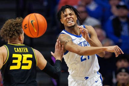 Jan 9, 2024; Lexington, Kentucky, USA; Kentucky Wildcats guard D.J. Wagner (21) passes the ball during the first half against the Missouri Tigers at Rupp Arena at Central Bank Center. Mandatory Credit: Jordan Prather-USA TODAY Sports