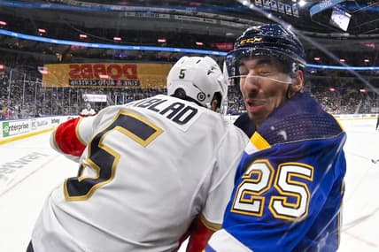 Jan 9, 2024; St. Louis, Missouri, USA;  Florida Panthers defenseman Aaron Ekblad (5) checks St. Louis Blues center Jordan Kyrou (25) during the second period at Enterprise Center. Mandatory Credit: Jeff Curry-USA TODAY Sports