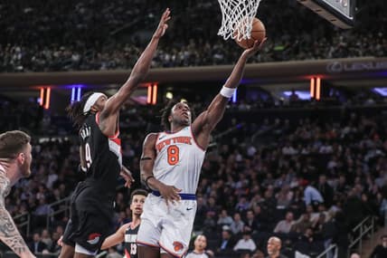 Jan 9, 2024; New York, New York, USA; New York Knicks forward OG Anunoby (8) drives past Portland Trail Blazers forward Jerami Grant (9) for a layup in the third quarter at Madison Square Garden. Mandatory Credit: Wendell Cruz-USA TODAY Sports
