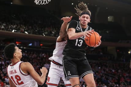 Jan 10, 2024; New York, New York, USA; Providence Friars forward Josh Oduro (13) grabs a rebound in the first half against the St. John's Red Storm at Madison Square Garden. Mandatory Credit: Wendell Cruz-USA TODAY Sports