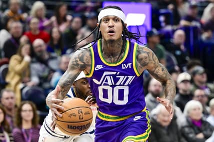 Jan 10, 2024; Salt Lake City, Utah, USA; Denver Nuggets forward/guard Justin Holiday (9) reaches for the ball by Utah Jazz guard Jordan Clarkson (00) during the second half at the Delta Center. Mandatory Credit: Christopher Creveling-USA TODAY Sports