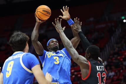Jan 11, 2024; Salt Lake City, Utah, USA; UCLA Bruins forward Adem Bona (3) goes to the basket against Utah Utes center Keba Keita (13) during the first half at Jon M. Huntsman Center. Mandatory Credit: Rob Gray-USA TODAY Sports